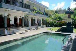 Отель Uluwatu Made Guesthouse  Kuta